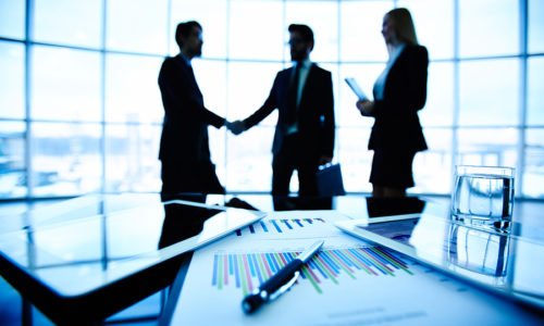 Technological devices, financial document with pen, glass of wat dynamics nav partner